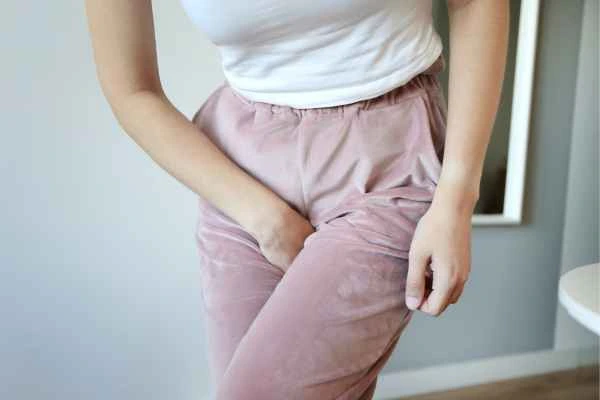 woman struggling with urine incontinence Solihull